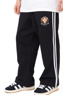 Sale Spodnie dresowe Flared Emblem Spodnie Dresowe|Spodnie Materiałowe
