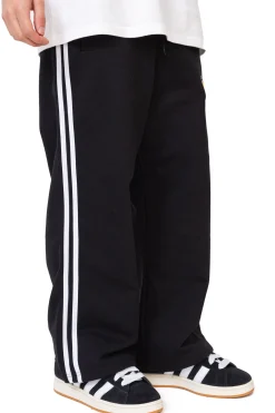 Sale Spodnie dresowe Flared Emblem Spodnie Dresowe|Spodnie Materiałowe