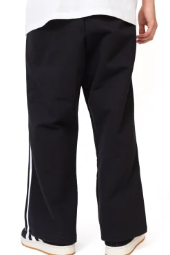 Sale Spodnie dresowe Flared Emblem Spodnie Dresowe|Spodnie Materiałowe